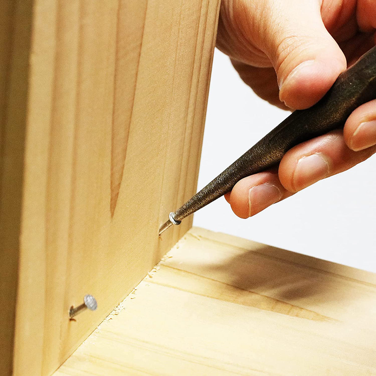 Hardened steel nail punch by Kawasei, perfect for carpentry and fine craftsmanship.