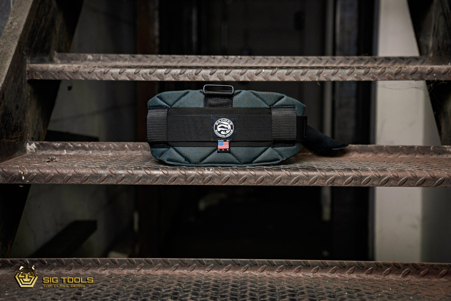 A Gunmetal Grey Badger Belt, a tool belt designed for convenient and organized storage of a variety of tools and accessories.