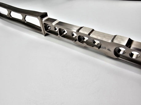 Close-up of the Titan titanium hammer handle featuring air pockets for shock absorption