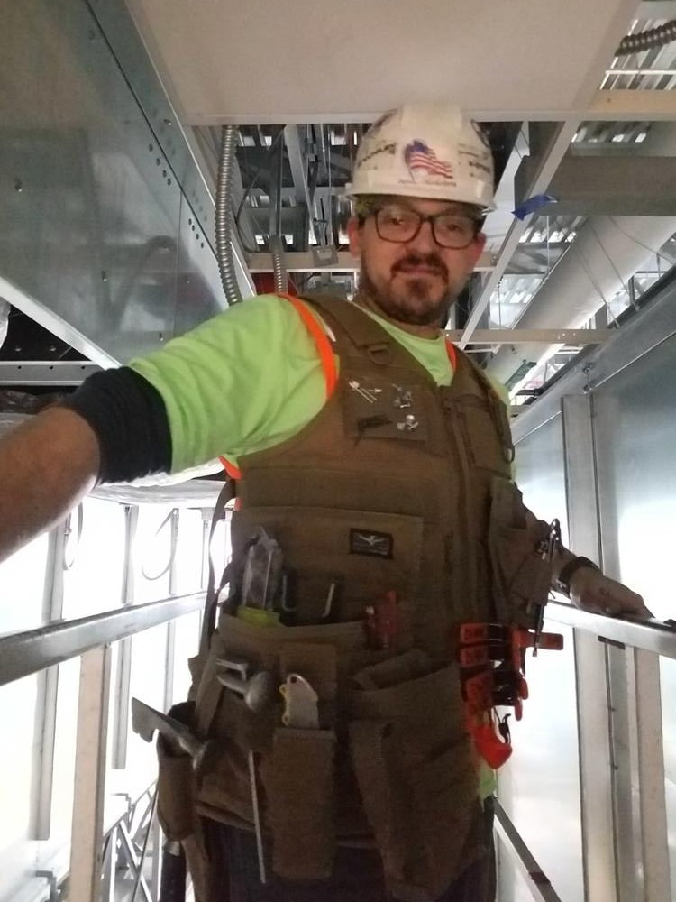 Sujeción de martillo AIMS™