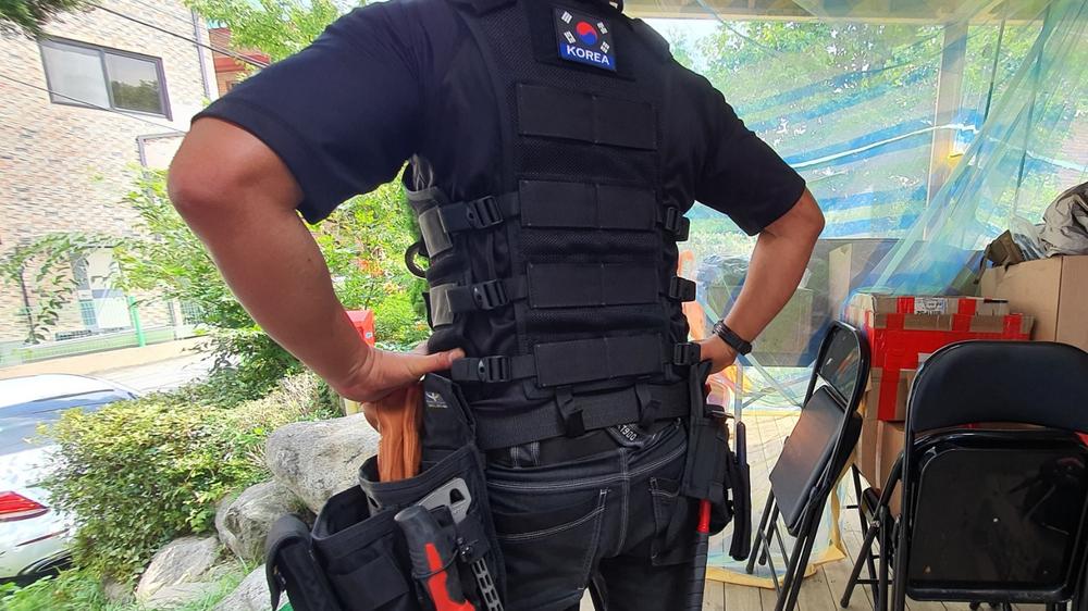 Sujeción de martillo AIMS™