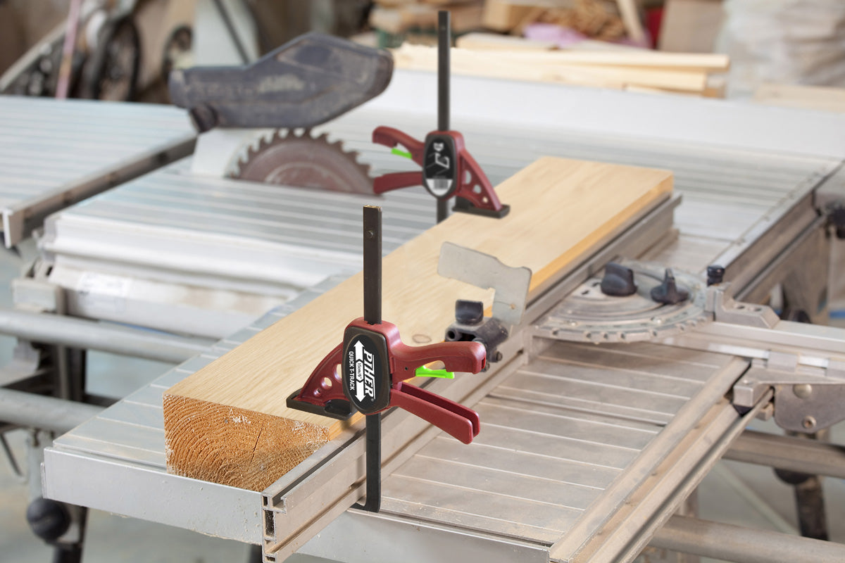The Piher T-Track Clamp being used to secure a workpiece on a T-Track workbench.