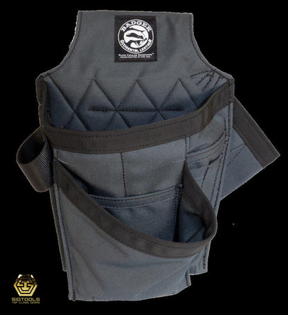 The Front view of the Gunmetal Trimmer Tool Bag, designed for carrying and organising tools and accessories, often used by professionals in trades such as construction and carpentry.