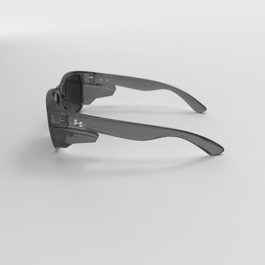 Hyspecs Serie ICON transparente con lente tintada en gris y protectores laterales