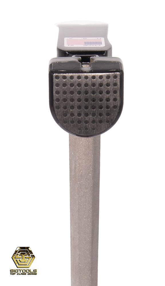 A close-up view showcasing the textured and dimpled steel head finish of the 12-ounce hammer, highlighting the hammer's surface details for enhanced grip and effectiveness.
