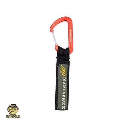 A Diamondback carabiner cord loop, a compact and durable tool accessory with a carabiner design for attaching and securing items